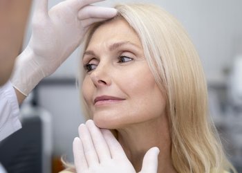 close-up-doctor-checking-woman